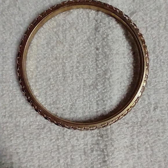 Goldtone mesh solid bangle bracelet - Picture 2 of 3